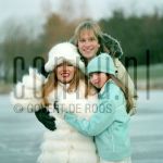 11-01-2003 Familie Paay Curry Patricia Paay, Adam Curry and Christina at home  in Belgium. January 11, 2003.

[keywords]Posed, Smiling, Fur Coat[/keywords]
